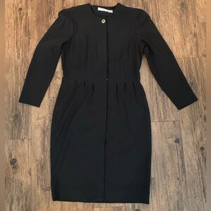 Vintage black tapered dress with gold top button by Liz Claiborne. 80’s